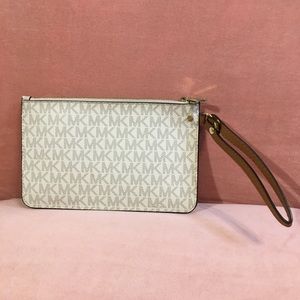**SOLD** Michael Kors Jet Set Monogram Wristlet